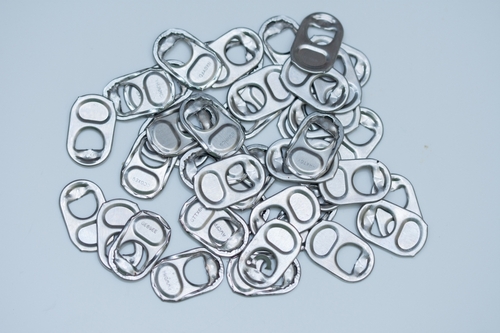 Pile of aluminum pop tabs